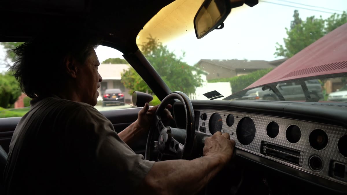 A classic car interior filmed in warm light